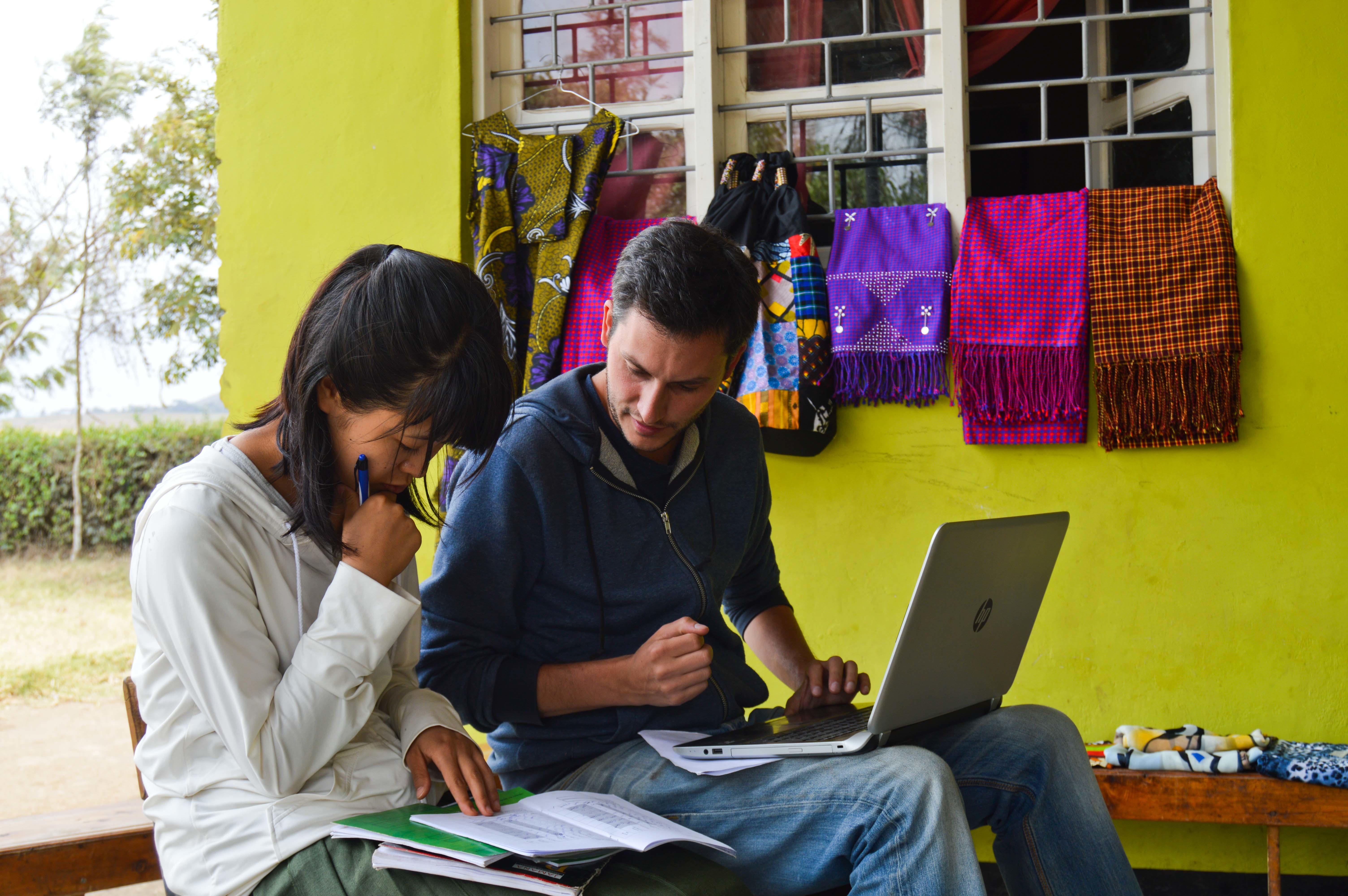 Two Projects Abroad interns meet to discuss their plans to help support entrepreneurs in Tanzania Interns meet to discuss business plans and loan management during our Micro-finance internship in Tanzania